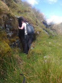 Walker going into O'Maille's Cave