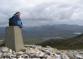 Surveying the view from the top of Tully Mountain